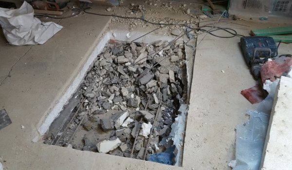 Trapopening in betonvloer maken